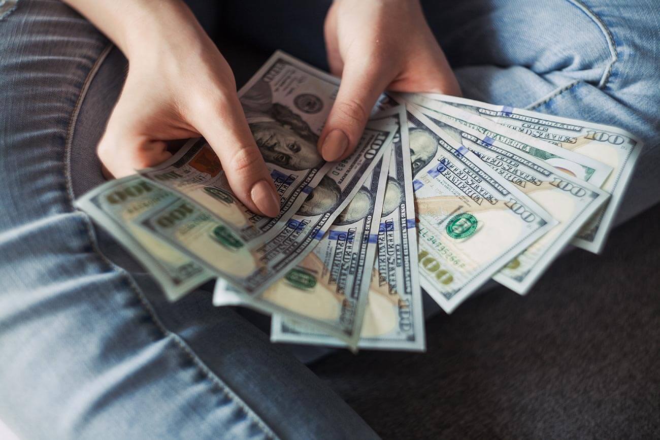Cash in a person's hands