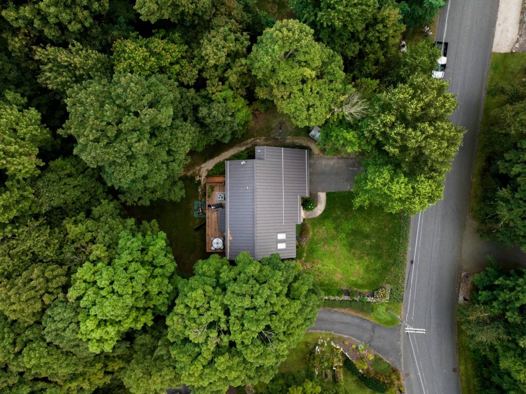 Residential geothermal in Belchertown: aerial shot of home